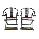 A pair of Chinese padouk and brass mounted folding chairs,