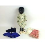 A 1950's Pedigree Topsy style hard plastic hand assisted walking doll with open close left right