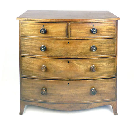 An early Victorian mahogany bow fronted chest of two over three graduated drawers on splay feet, h.