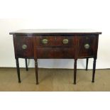 A Regency mahogany and ebony line inlaid bow fronted sideboard,