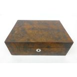 An Edwardian burr elm sewing box with green water silk fitted interior,