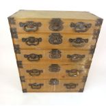 A 19th century Japanese Hinokio (cypress) and iron work chest of five graduated drawers, h.
