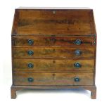 A mid 18th century mahogany bureau,