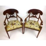 A pair of Empire-type mahogany framed open arm chairs, with hunting scene upholstery, h. 90 cm, w.