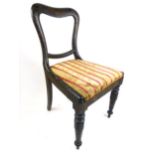 A Victorian ebonized and foliate decoupage single chair with stripped upholstered pad seat on