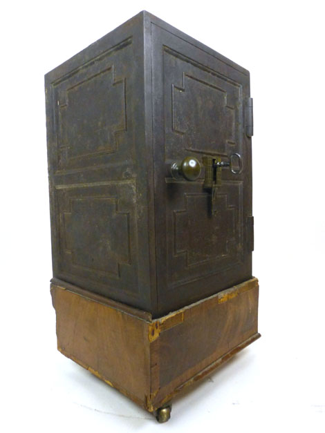 A 19th century cast iron safe on associated wooden base with hidden lock feature, safe h. 51 cm, w. - Image 2 of 6