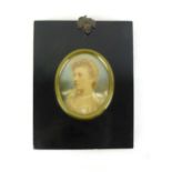 A late 19th/early 20th century miniature watercolour portrait of a young lady,