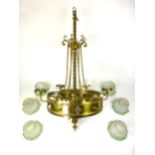 A late 19th century brass Gothic style six branch chandelier having six green etched glass shades,