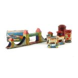 A collection of tinplate toys comprising of a boxed Sky Patrol, three wheel along horses,