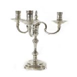 A silver hallmarked three branch candelabra, Birmingham 1971, h. 22 cm, weight approx.