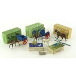 A Britains farm cart and horse together with a milk float and horse both boxed together with part