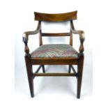 An early 19th century mahogany open armchair with an upholstered drop in seat, l. 88 cm, w.