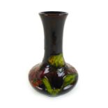 A Moorcroft bottle vase, decorated in the 'Pomegranate' pattern, impression and paint marks to base,