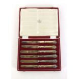 A cased set of six silver hallmarked knives, Sheffield various dates, weight approx.