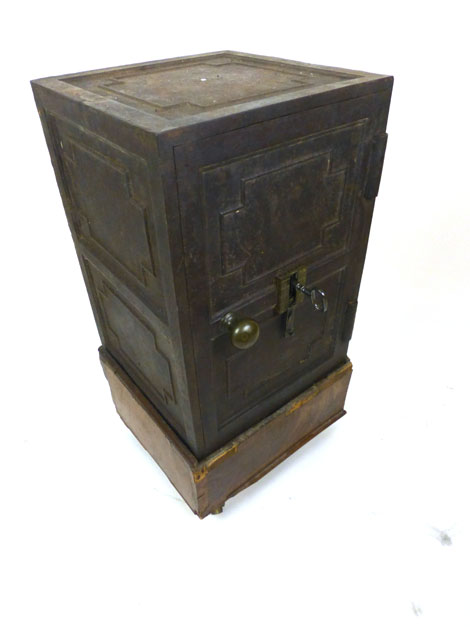 A 19th century cast iron safe on associated wooden base with hidden lock feature, safe h. 51 cm, w. - Image 3 of 6