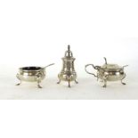 A silver hallmarked condiment set comprising of salt, mustard and pepper pot, Birmingham 1971,