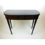 A late 18th century mahogany and ebony line inlaid card table,