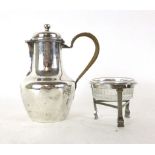 A French white metal hot water pot with bound handle together with a French white metal stand with