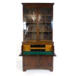 A 19th century mahogany and line inlaid secretaire bookcase,
