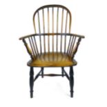 A 19th century Windsor armchair on turned legs, h. 106 cm, w. 60 cm. d.