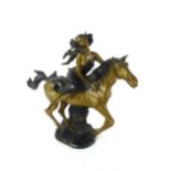 A cast figure modeled as a woman on a horse galloping, on an undergrowth base, h.