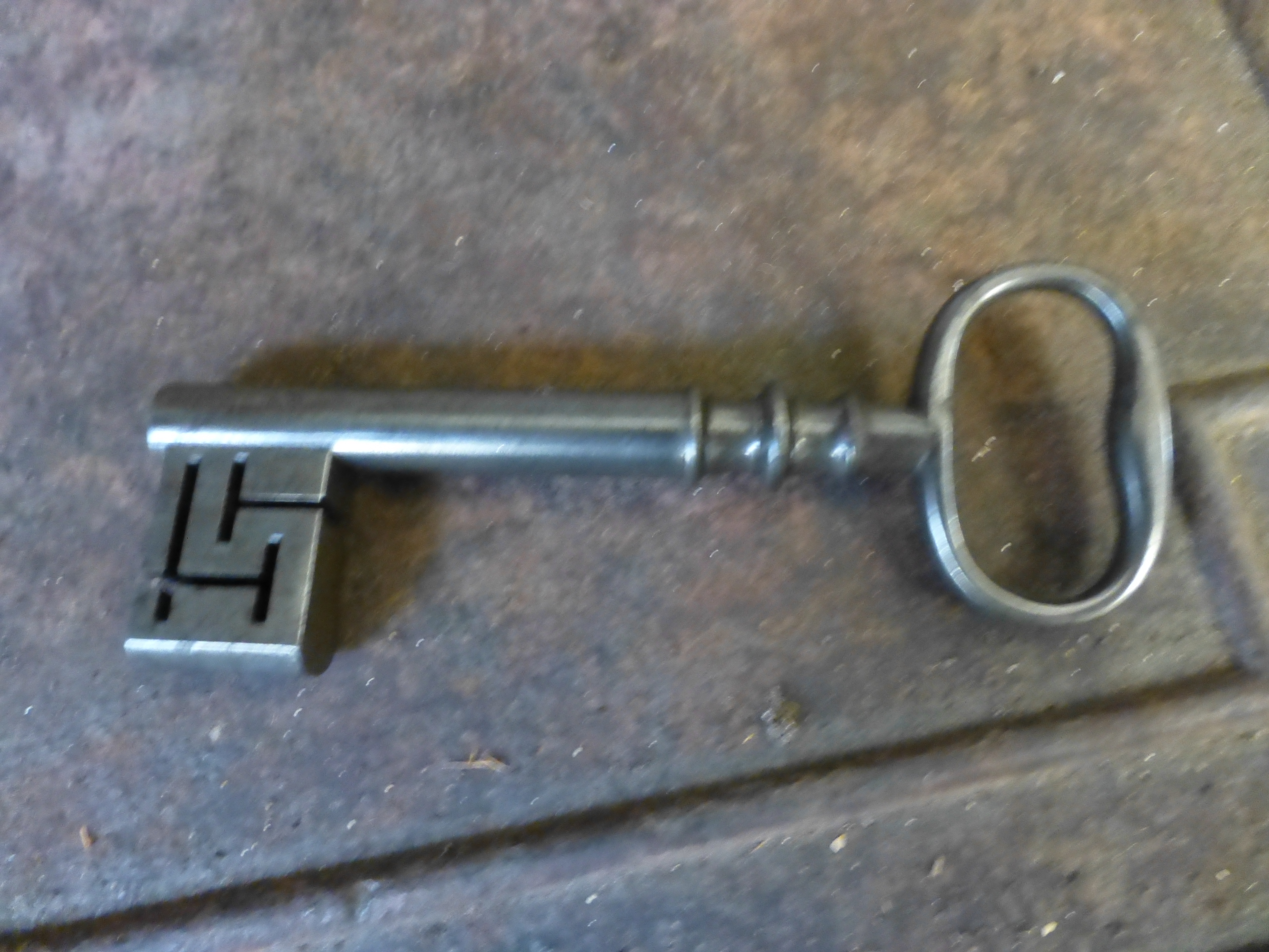 A 19th century cast iron safe on associated wooden base with hidden lock feature, safe h. 51 cm, w. - Image 4 of 6