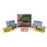A collection of boxed die cast vehicles including a Toyota GT and Sunbeam Alpine from the James