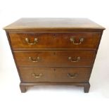A George III mahogany chest of three drawers, the moulded top above bank of drawers on bracket feet.