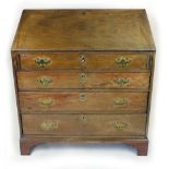 A late 18th century mahogany bureau,