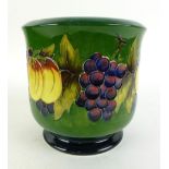 A William Moorcroft squat cylindrical bowl, decorated with fruits,