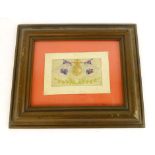 An early 20th century framed and glazed silk embroidered postcard with Royal Flying Corps crest to