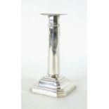 An early 20th century silver hallmarked candlestick, Sheffield 1930, weighted, h. 16.