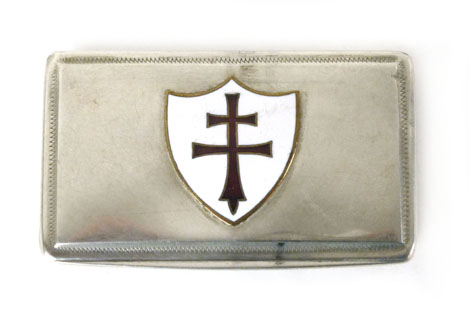 A French white metal engine turned snuff box, bearing a red cross of Lorraine in a white shield,