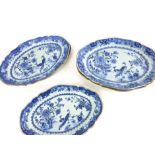 A group of five oval graduated meat plates,