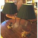 TABLE LAMPS, a pair, copper of ring form on stepped bases with black shades, 69cm H.