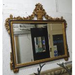 OVERMANTEL MIRROR, bevelled with a decorative floral gilt swagged surmount, 110cm x 106cm H.