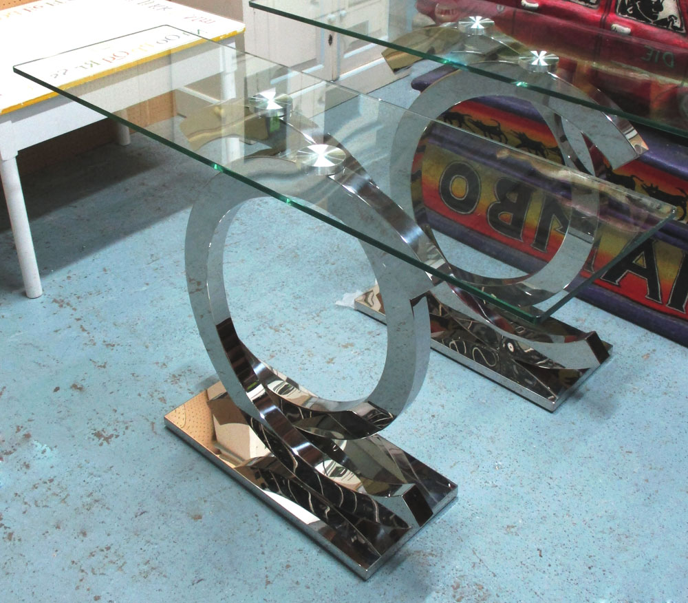 'COCO' CONSOLE TABLE, with glass top on a chromed metal base, 121cm x 38cm x 78cm H.
