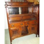 DRESSER, Arts & Crafts, oak, with shelved mirror back above two drawers,