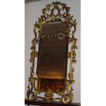 WALL MIRRORS, a pair, Chippendale style gilt framed with scroll, leaf and flowerhead decoration,