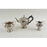 SILVER TEA SERVICE, late Victorian, comprising tea pot, milk jug and sucrier,