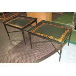 TRAYS, a pair, on stands floral design on a bottle green ground matching stand with square supports,