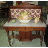 WASH STAND, Edwardian satin walnut with tiled splash back, marble top, two drawers and a door,