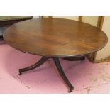 BREAKFAST TABLE, George III mahogany with oval tilt top on pedestal with leaf carved swept legs,