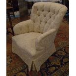 ARMCHAIR, with a buttoned back and beige patterned upholstery, 76cm W.