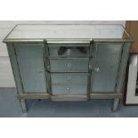 MIRRORED SIDEBOARD, with four drawers with cupboards to side on square supports,
