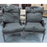 WINGBACK ARMCHAIRS, a pair, model 'Edgard' from Andrew Martin, distressed showframes,