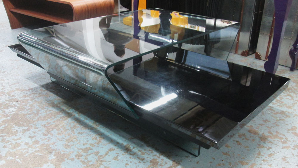 REFLEX LOW TABLE, with a sliding glass top on a rectangular black base, 140cm W x 98cm D.