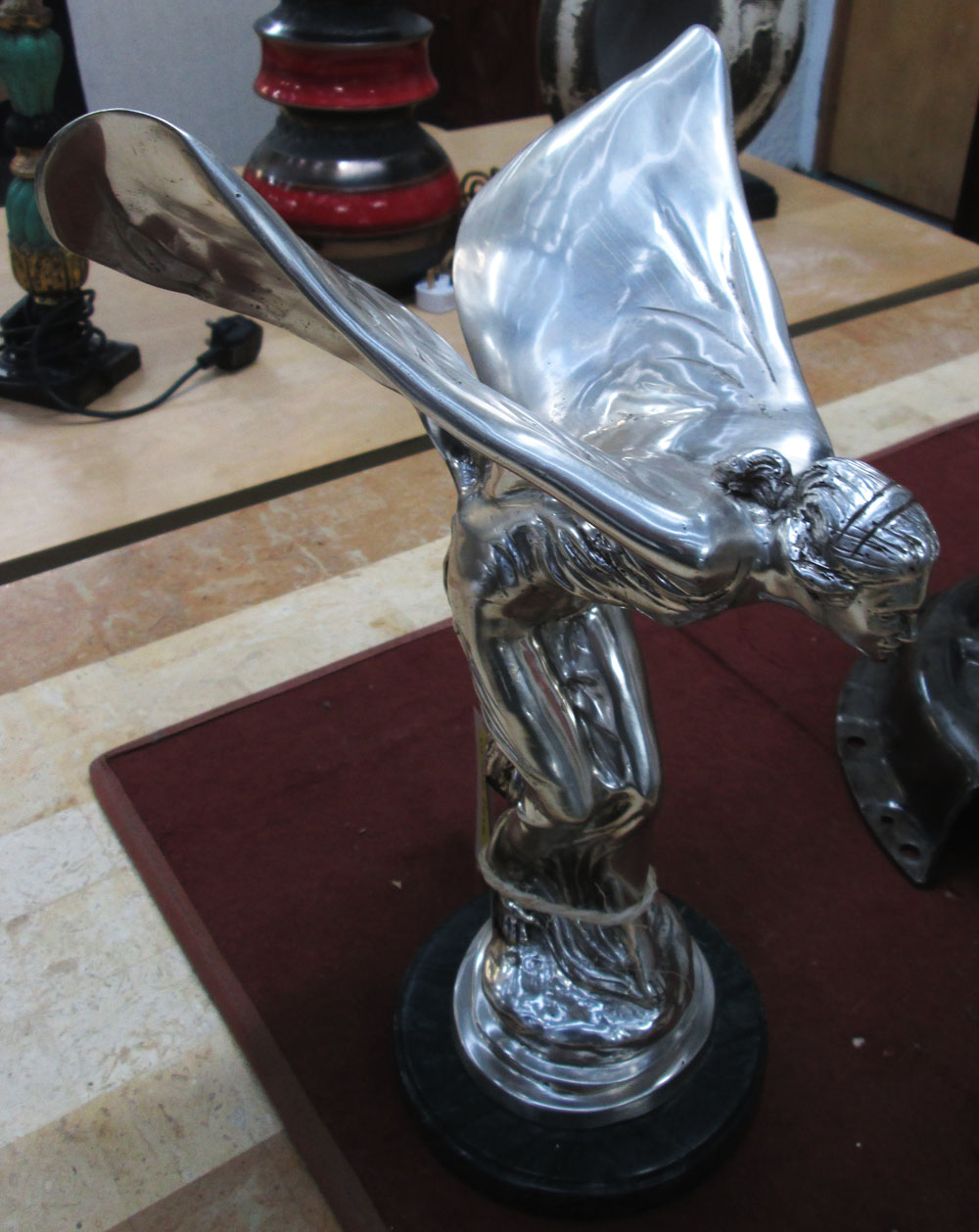 'SPIRIT OF ECSTACY' FIGURE, plated finish, on round marble base, 36cm H x 23cm W.