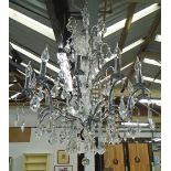 CHANDELIER, Continental style twelve branch with faceted drops, approx 85cm H.
