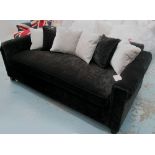 SOFABED, in black fabric on square supports plus six scatter cushions, 208cm L.